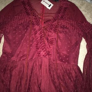 Buckle wine colored shirt